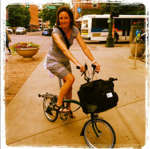 Amy Morfas rides a Brompton bike
