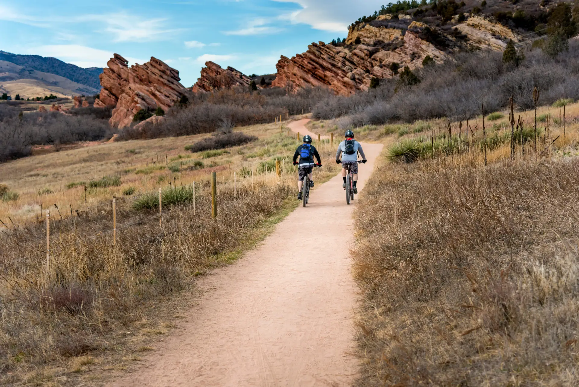 Bicyclists ride on trail