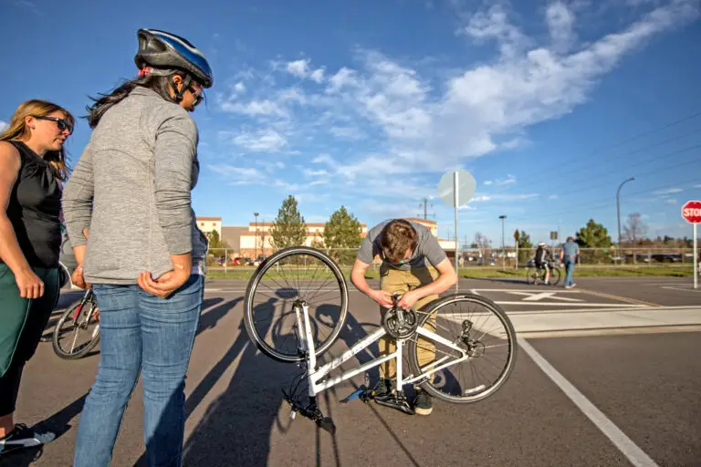 Adult male fixing a bike