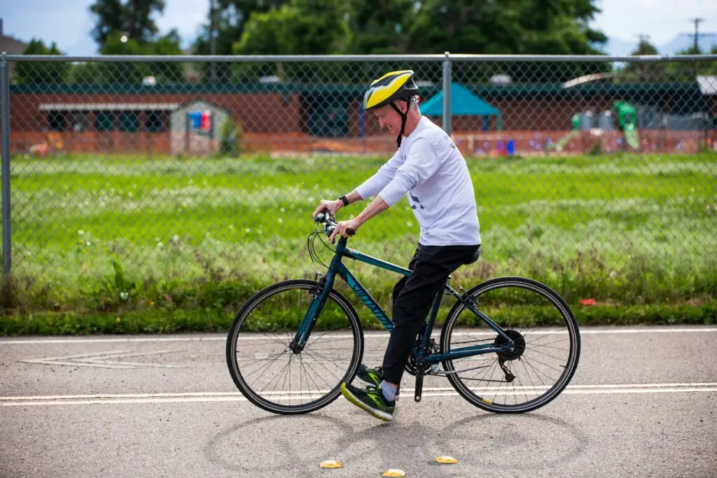 Adult learning to ride a bike