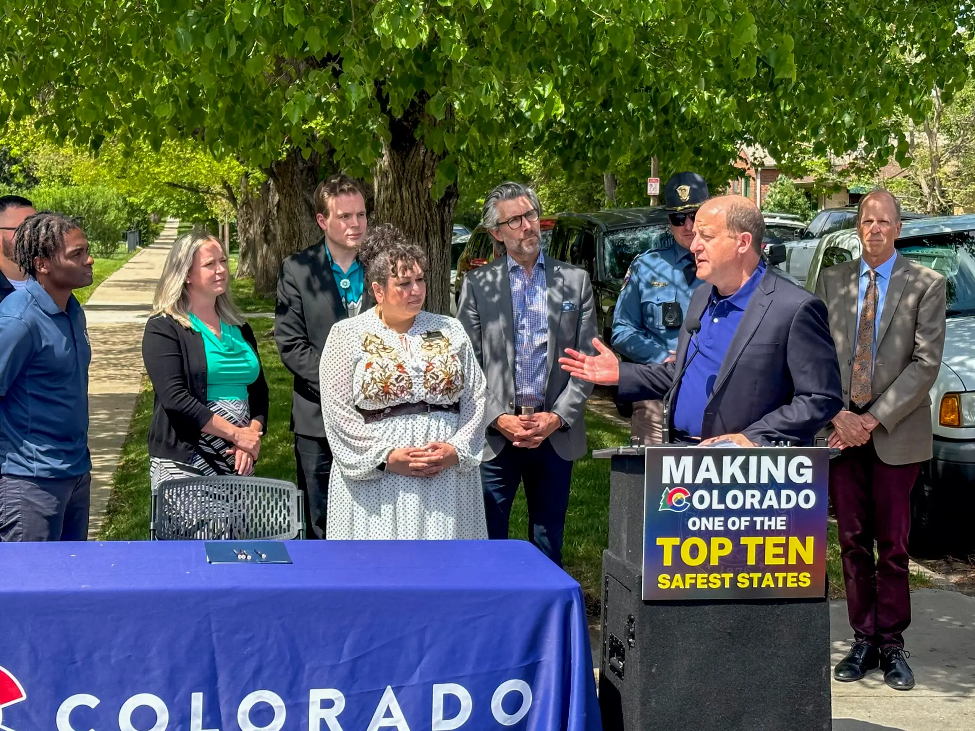 Advocates gather for a bill signing with the governor