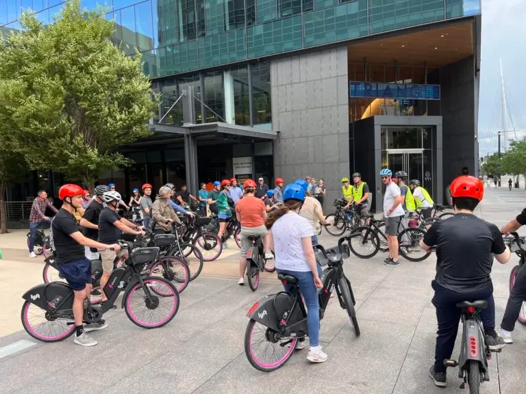 A group of bicyclists gathers together