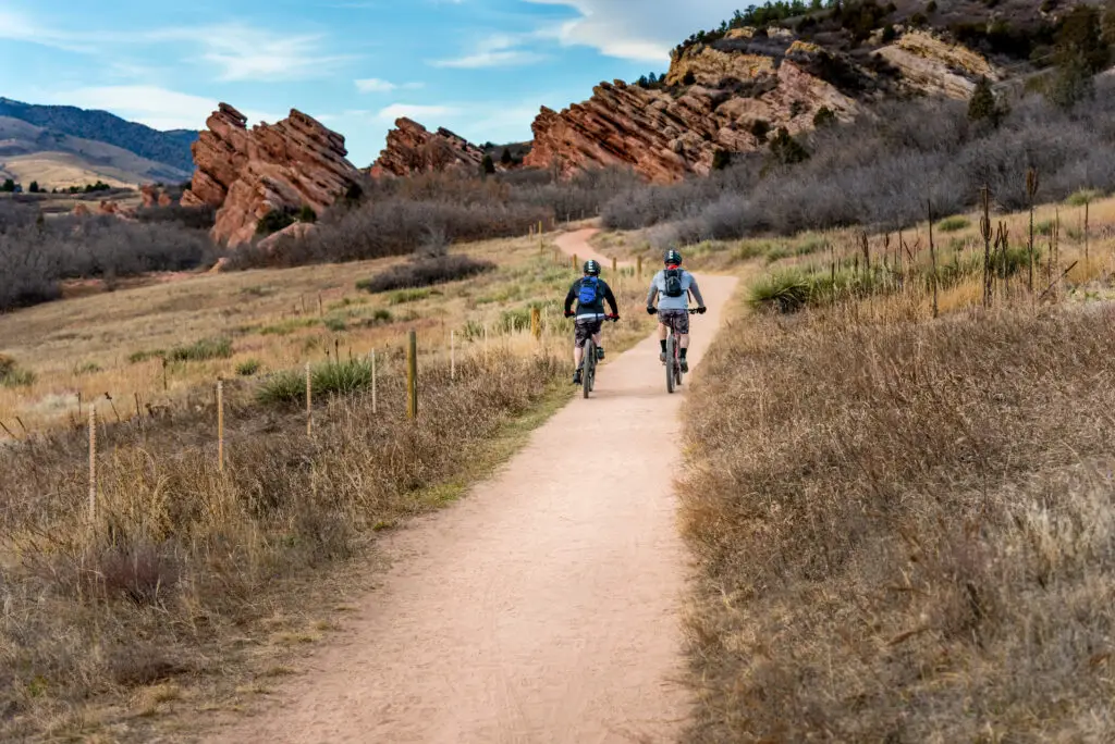 Bicyclists ride on trail