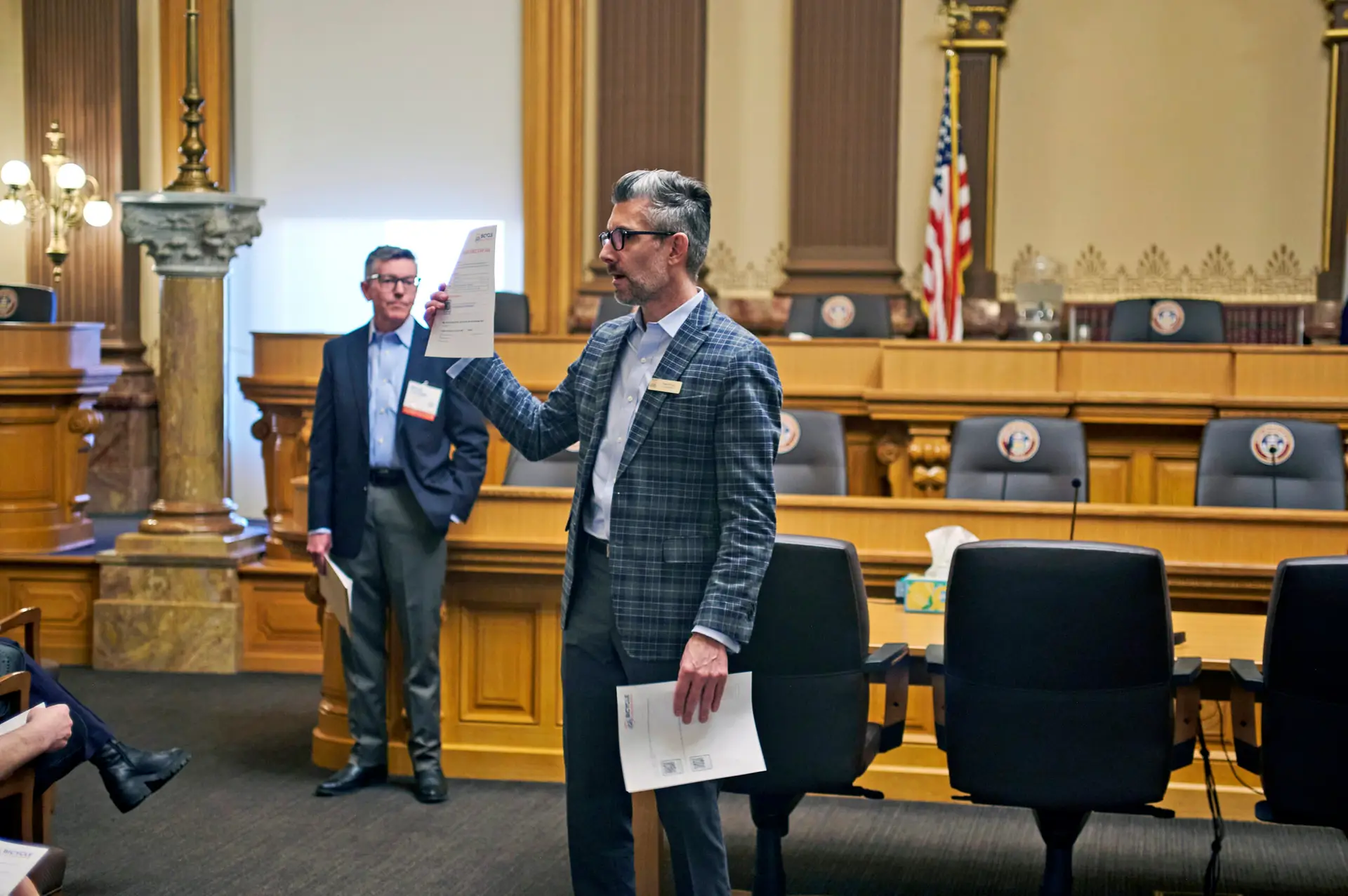 Staff speaks to advocates at the capitol