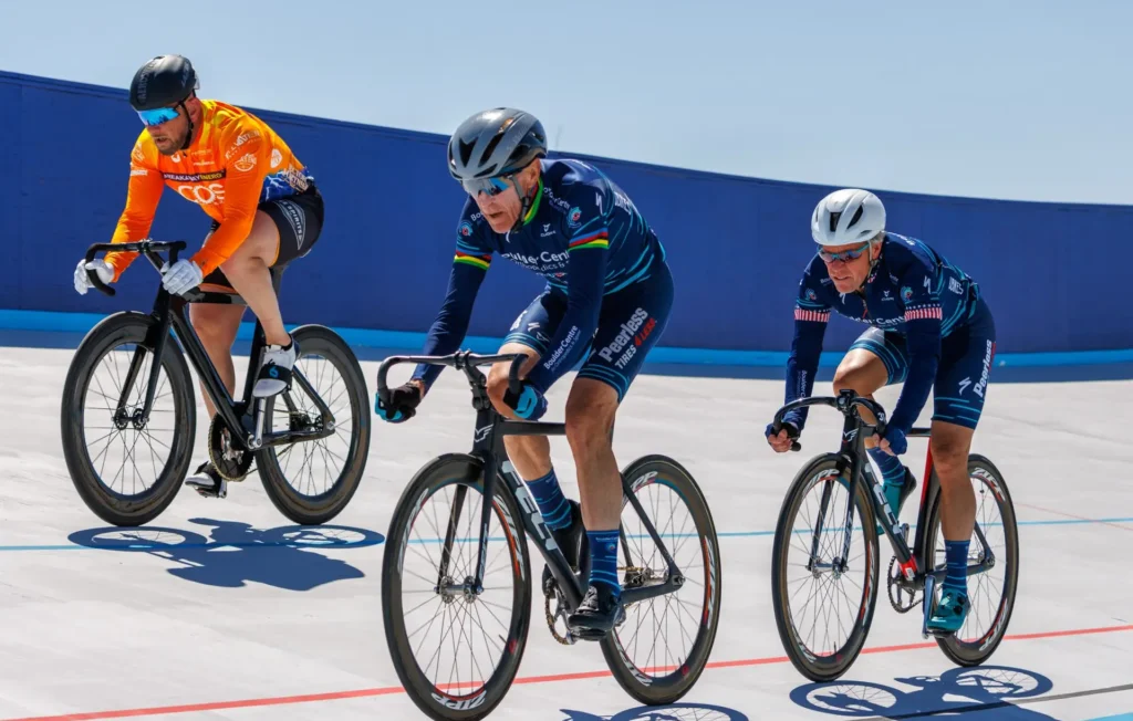 Bicyclists ride on velodrome