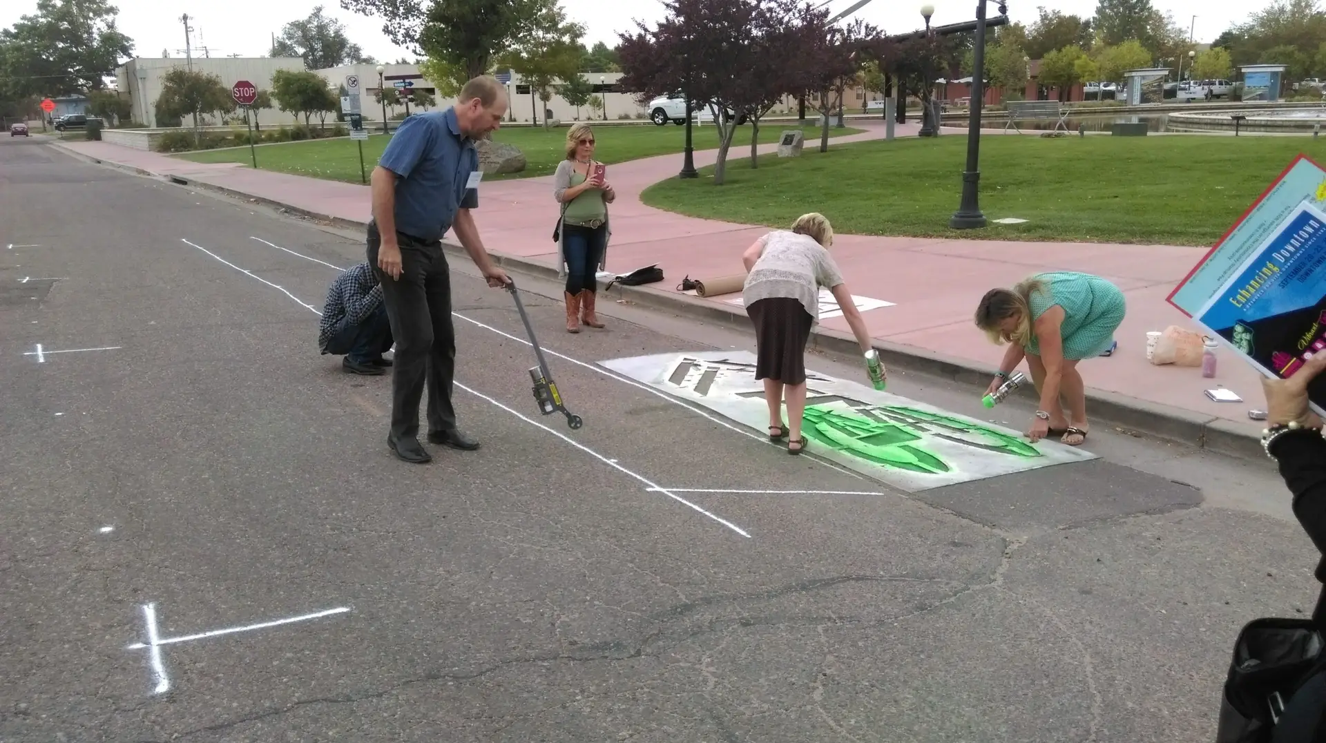Advocates mark the street for bike infrastructure