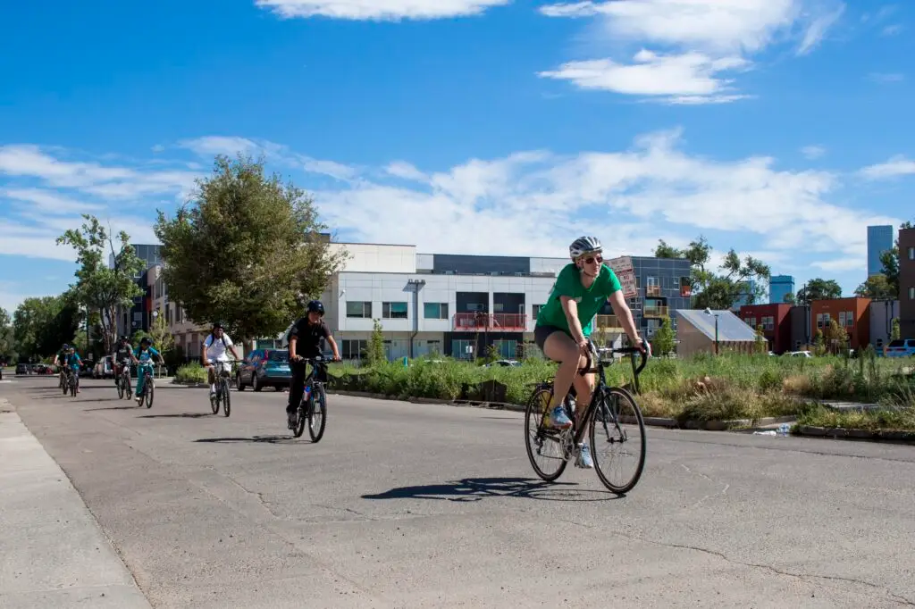 Bicyclists ride on road