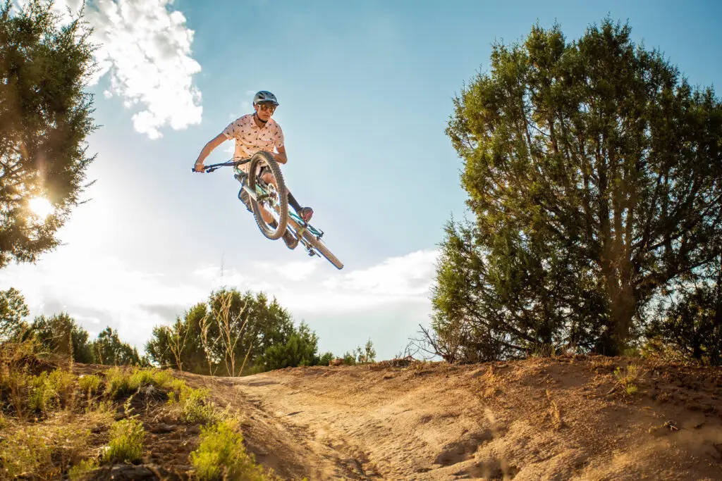 Bicyclist riding on mountain bike trail