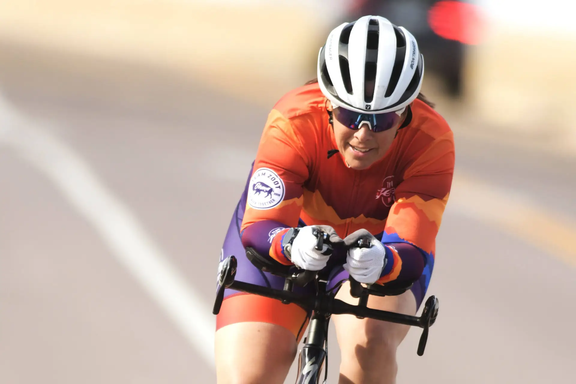 Bicyclist riding in time trial