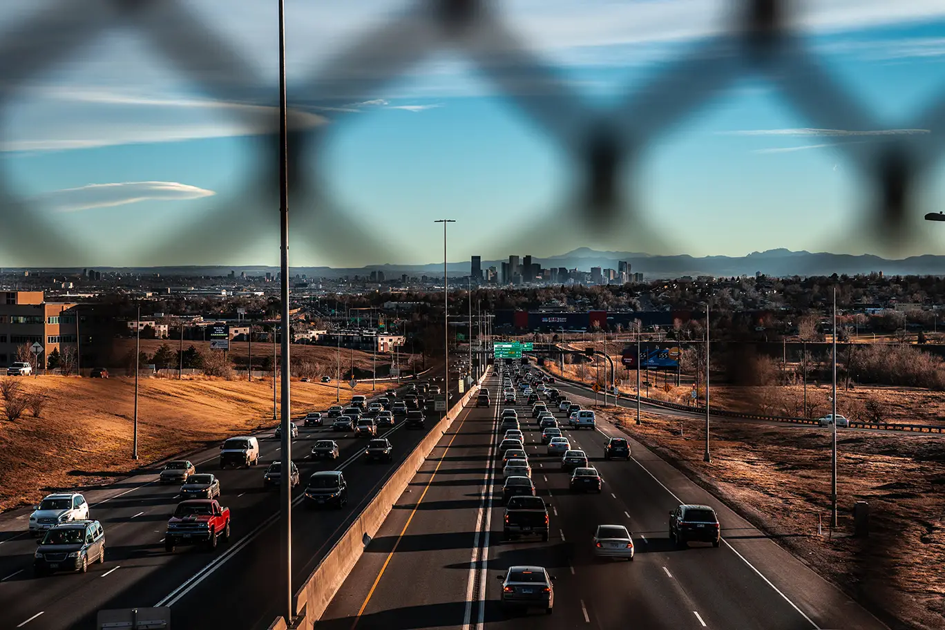 Highway view through fence