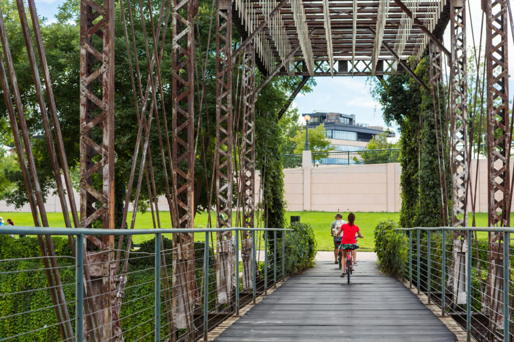 Bicyclists on bike path bridge